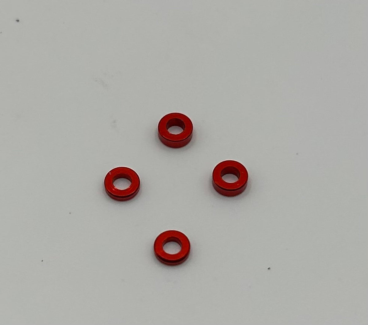 MWX Red Anodized Shims (1 and 1.5mm) 4pcs - HeliDirect